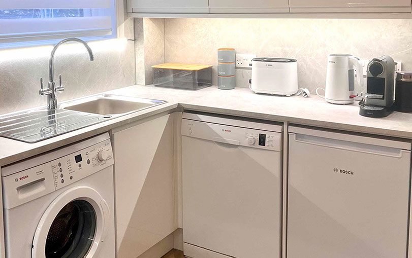 Glas Eilean View Self Catering Accommodation contains a modern kitchen with oven washing machine fridge and Nespresso coffee machine 