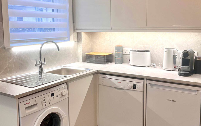 Glas Eilean View Self Catering Accommodation contains a modern kitchen with oven washing machine fridge and Nespresso coffee machine 