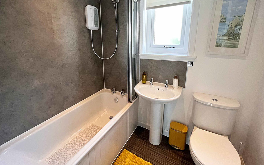 Twin bed accommodation in Dornie at Glas Eilean View with private guest seating area