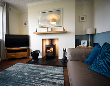 Glas Eilean View living room contains a woodburning stove sea views smart tv WIFI Superfast internet 