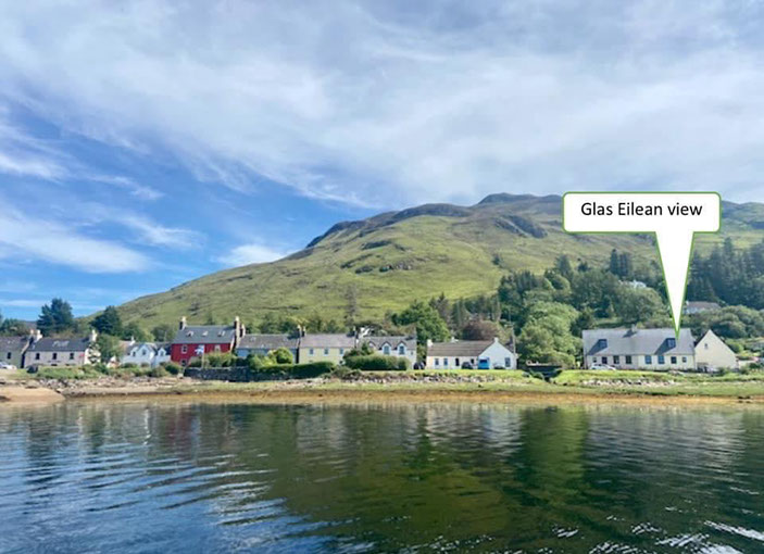 Glas Eilean View living room with woodburning stove sea views electric recliner seats and Smart TV with Freeview TV